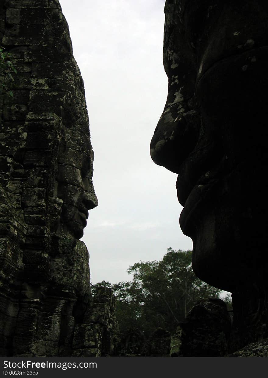 Carved stonefaces in Ankor Wat, Cambodia. Carved stonefaces in Ankor Wat, Cambodia