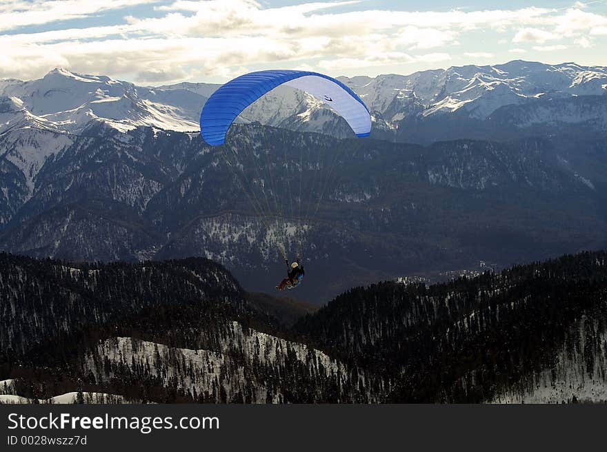 Paraglider in the mountains. Paraglider in the mountains