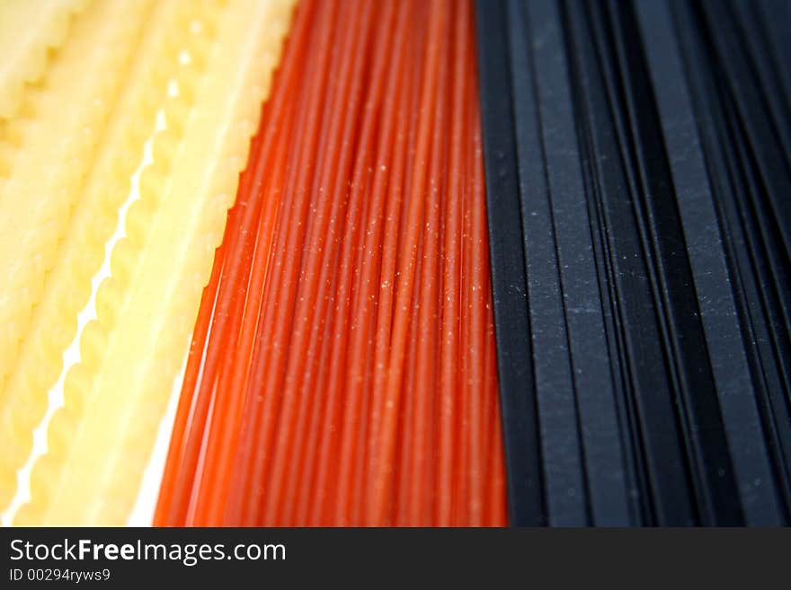 Background with three kinds and colors of pasta. Background with three kinds and colors of pasta