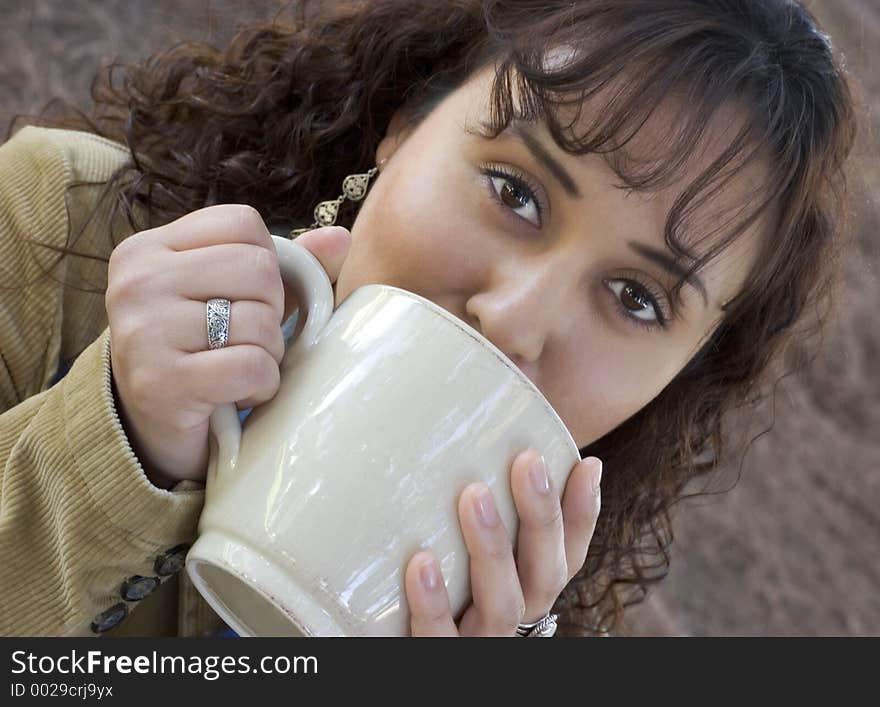 Beautiful girl drinking