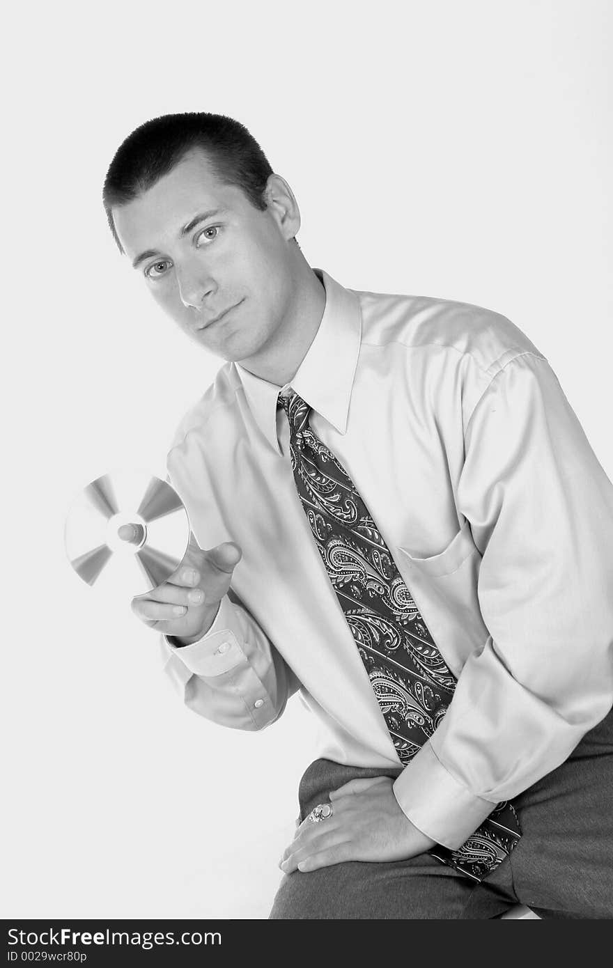 Black and white of guy with cd in hand. Black and white of guy with cd in hand