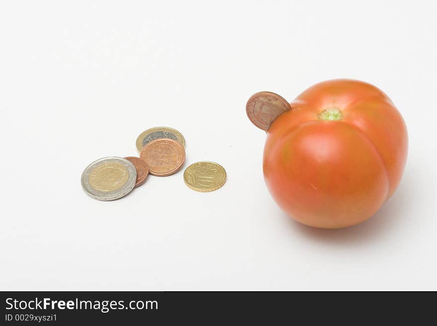 Coin inserted in tomato