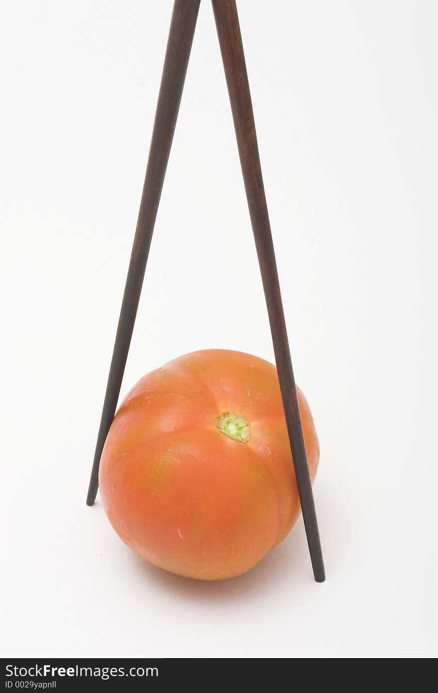 Tomato With Chopsticks