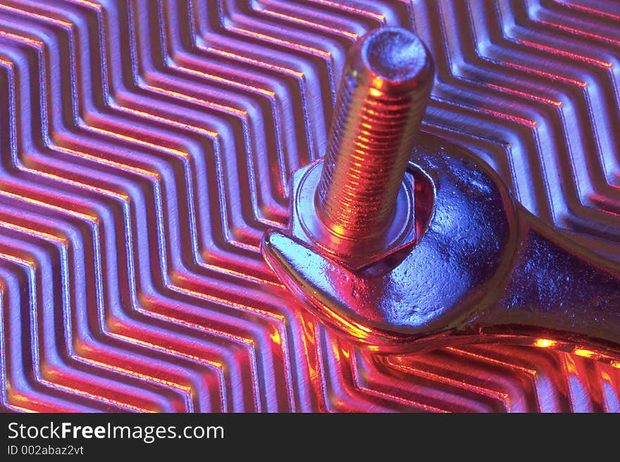 Tools on metal plate under low light. Tools on metal plate under low light.