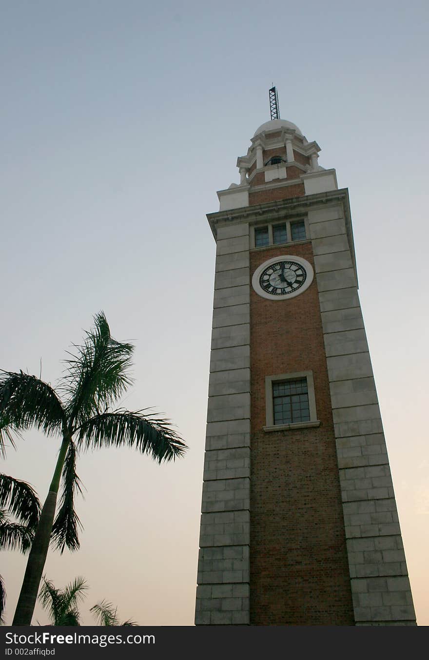 Old clock tower in Kowloon, Hong Kong (where a train station used to be). Old clock tower in Kowloon, Hong Kong (where a train station used to be).