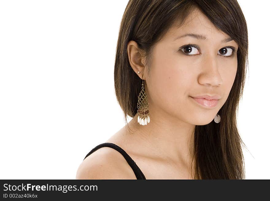 A pretty young teenage girl in a black top on white background. A pretty young teenage girl in a black top on white background