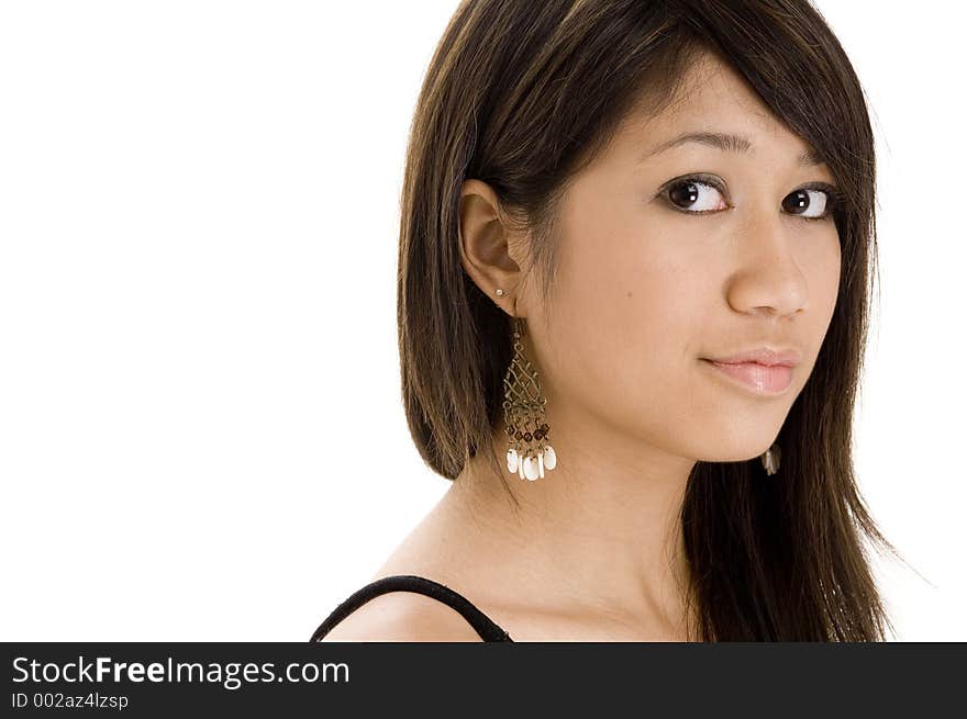 A pretty young asian woman in black on white. A pretty young asian woman in black on white