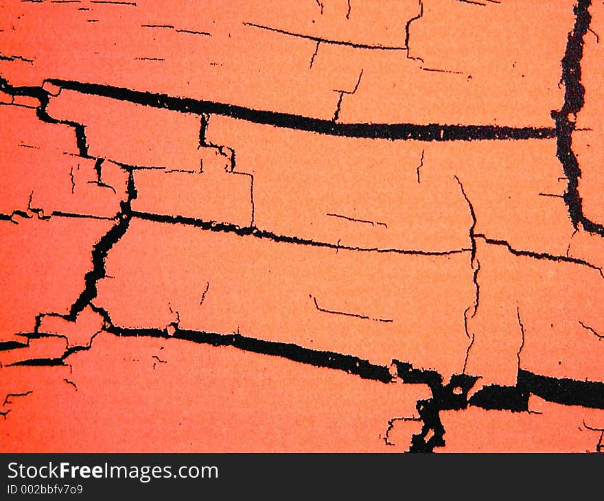 Salmon colored cracked background