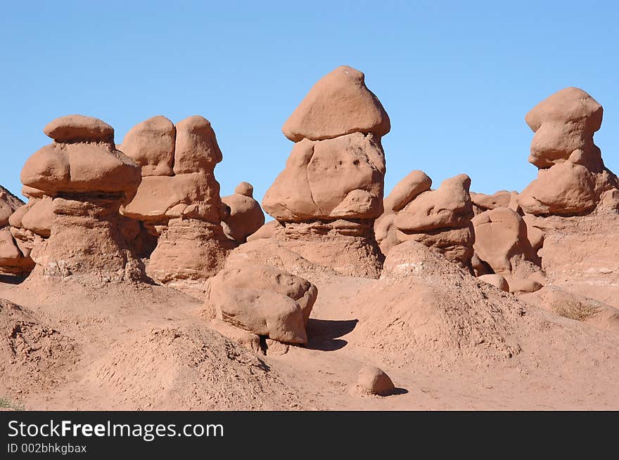 It shows a formation of fantastic rocks in the mushroom valley