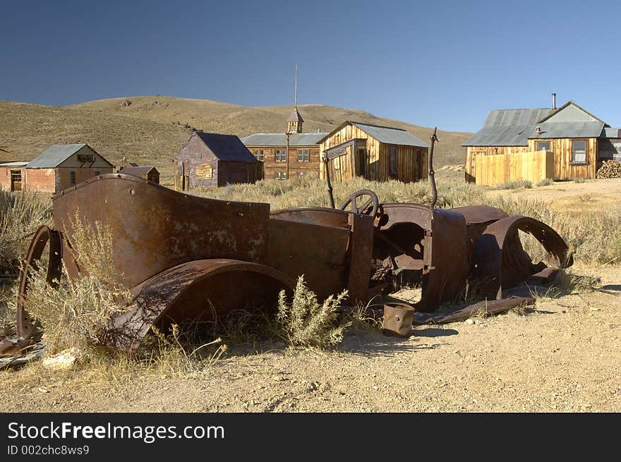 Rusty old car in a ghost town in California. Rusty old car in a ghost town in California.