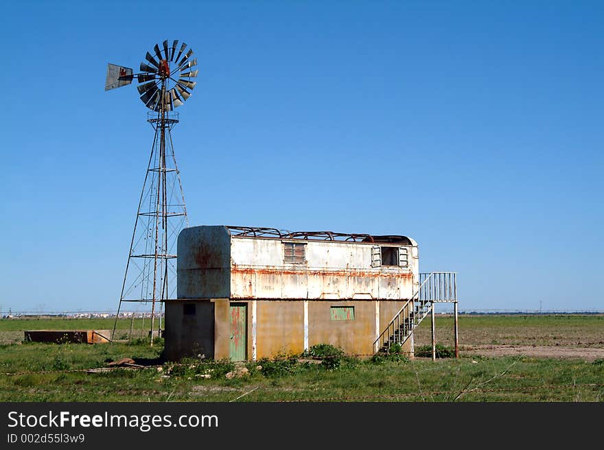 Old farm and windmill