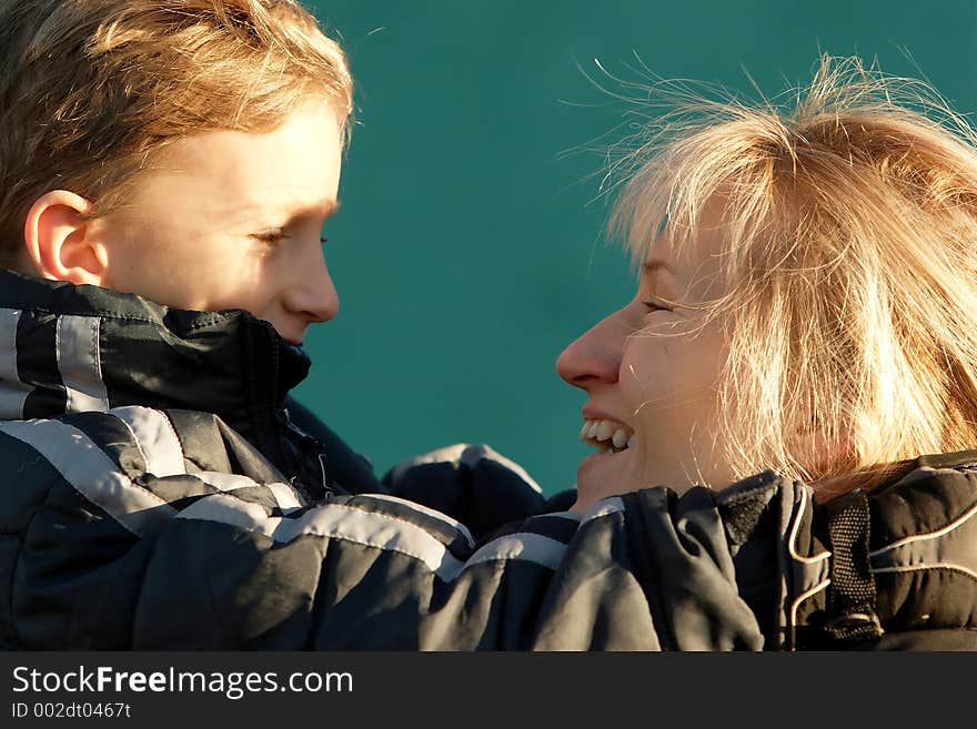 Mother and son sharing a joke.