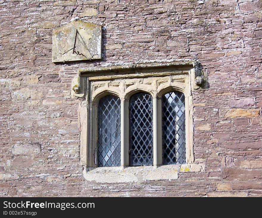 Sundial on the wall of Llanvihangel Court, Pandy, Wales. Sundial on the wall of Llanvihangel Court, Pandy, Wales