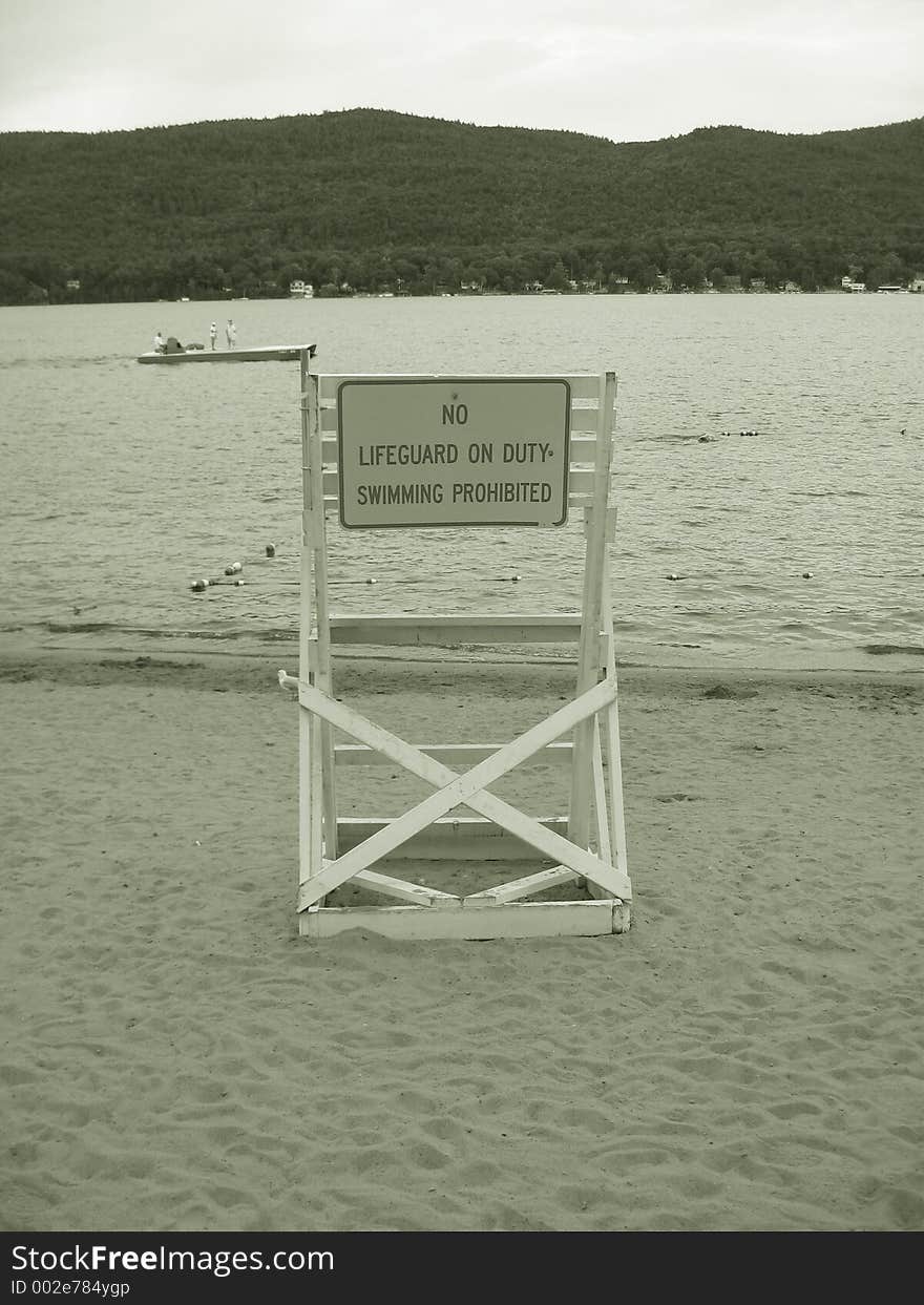 No Lifeguard on Duty sign on Lake george, New York.