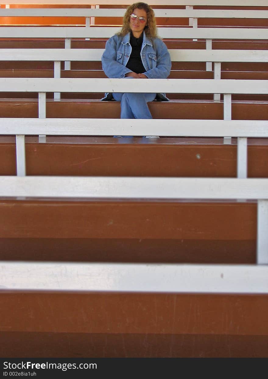 Woman Sits by Herself. Woman Sits by Herself