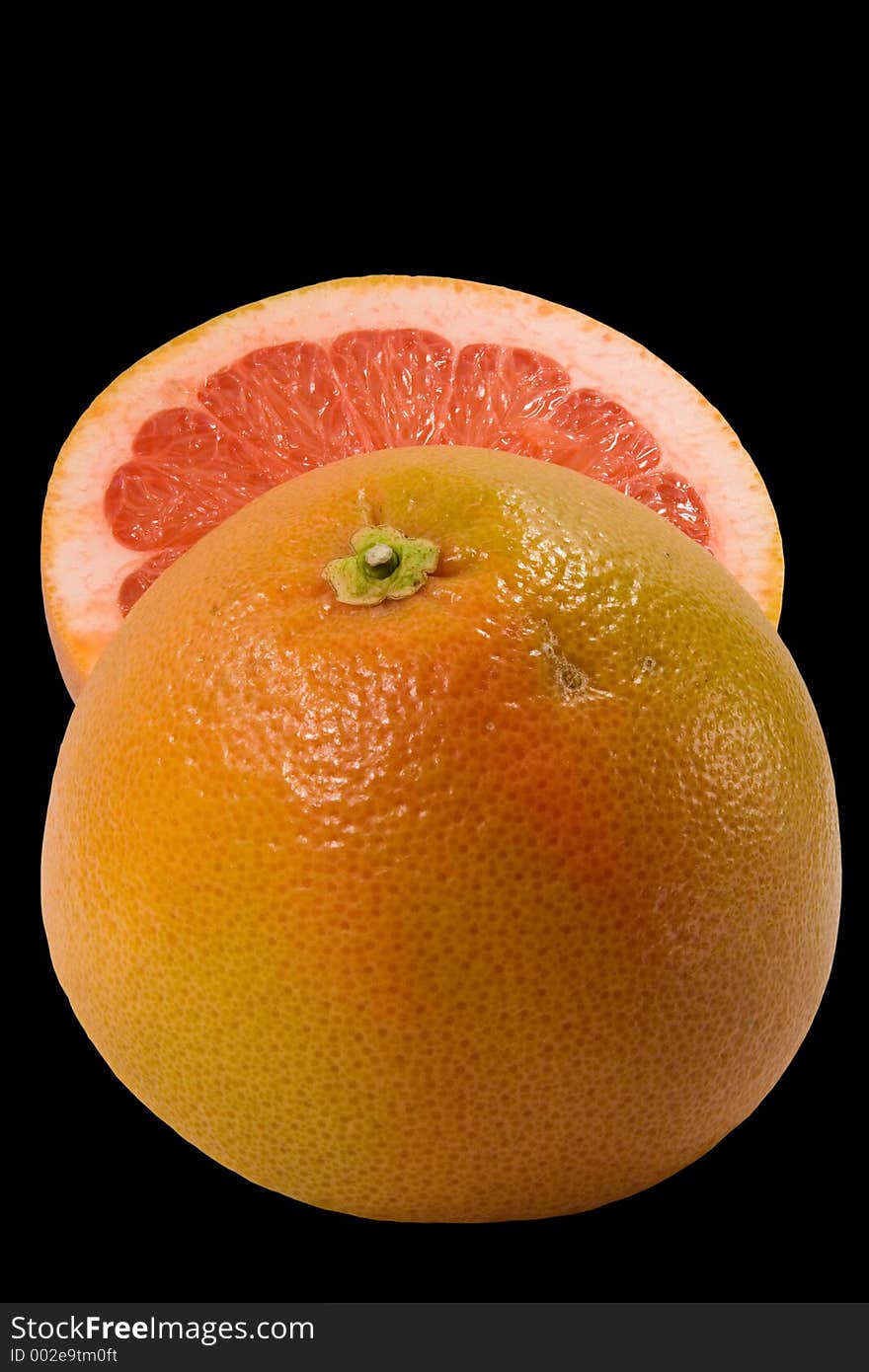 Couple Half Of Grapefruit Isolated On Black