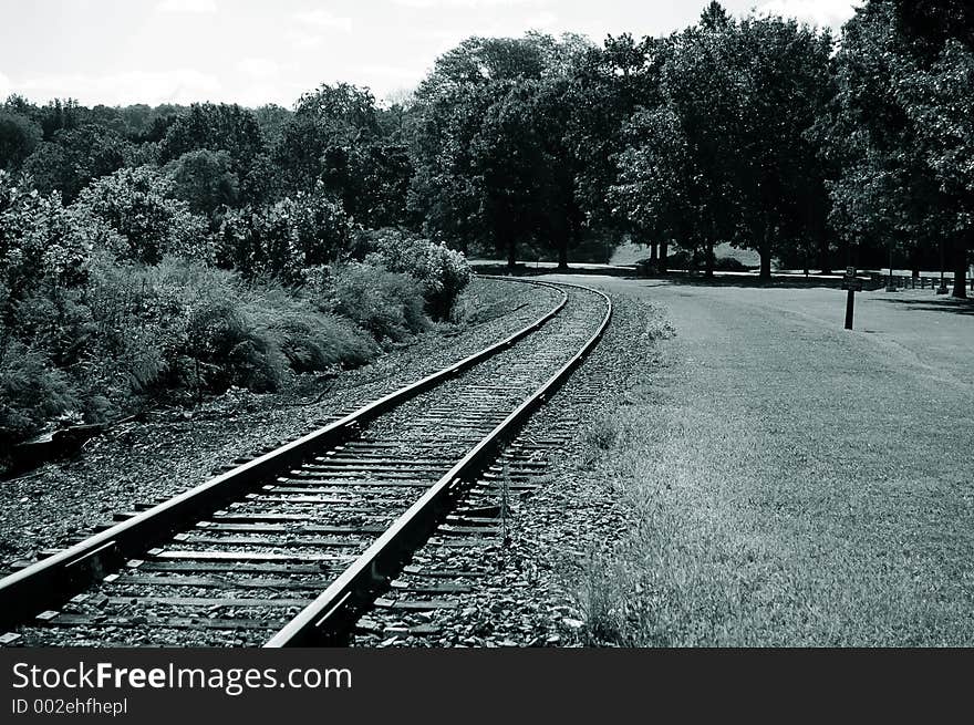 Train track through rural setting - monochromatic