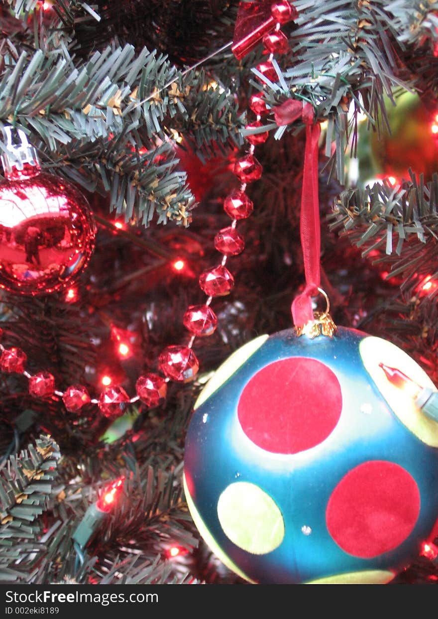 This image depicts Christmas tree decoration up-close. This image depicts Christmas tree decoration up-close.