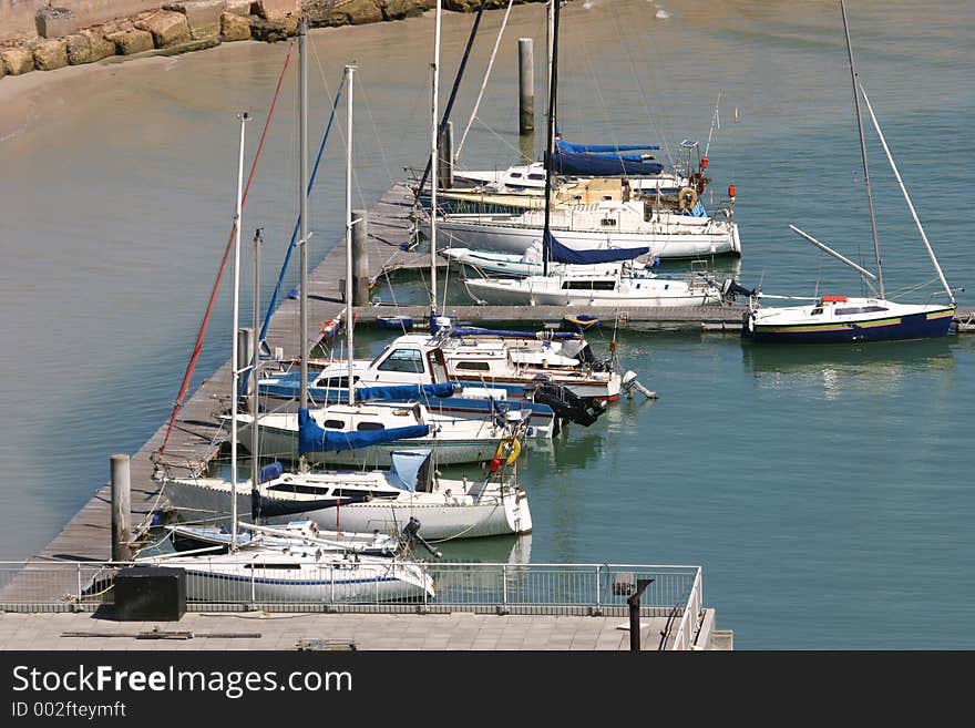 Safety in the harbour, yachts in a row