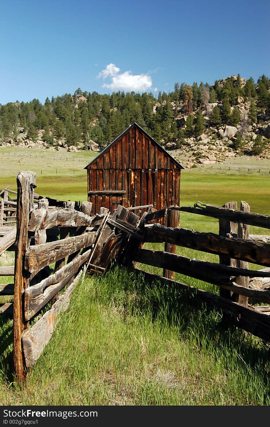 Old wooden shed standing in mountain meadow. Old wooden shed standing in mountain meadow