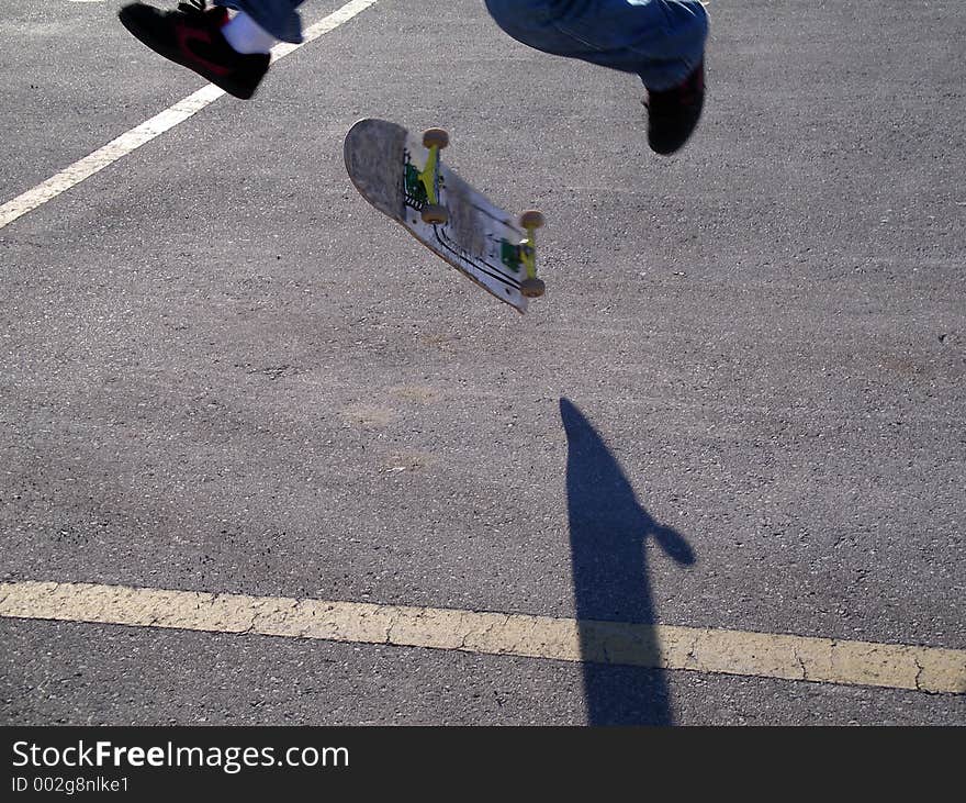 Skateboard trick with a shadow