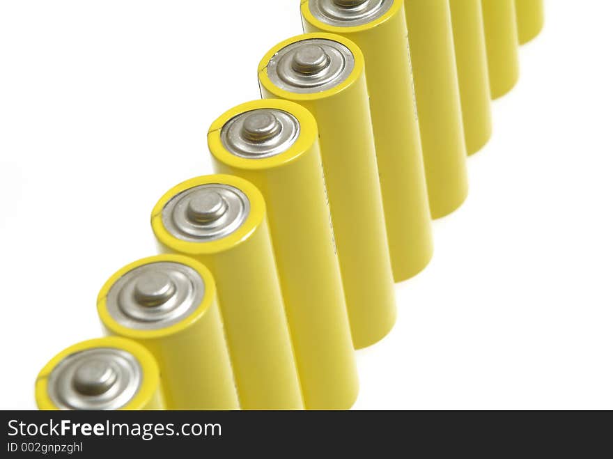 Yellow batteries over white