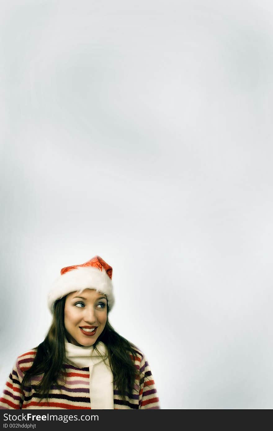 Female Santa's Helper smiling in the bottom corner of a page, with lots of room/space for copy. Female Santa's Helper smiling in the bottom corner of a page, with lots of room/space for copy.