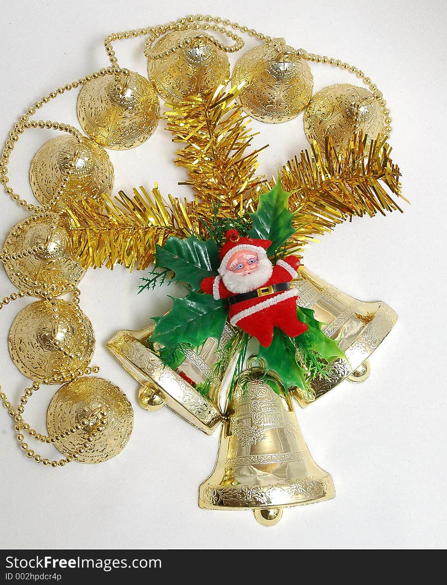 Handbells a red sphere and a bow Christmas decoration on white background