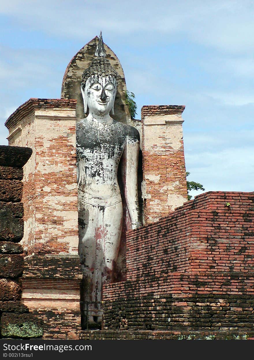 Thai Temple with a standing Buddha