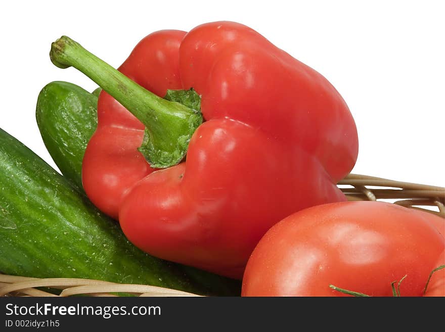 Basket with vegetables on white background with clipping path