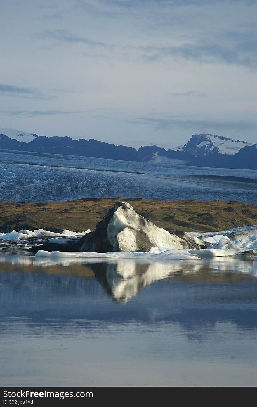 Reflection In Blue Water