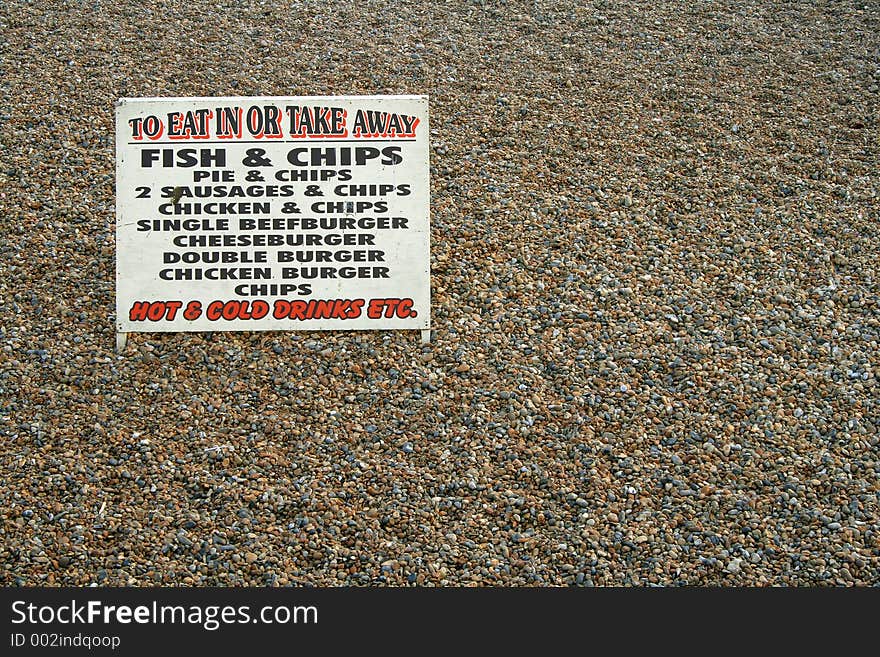 Cafe sign on Brighton beach (room for text). Cafe sign on Brighton beach (room for text)