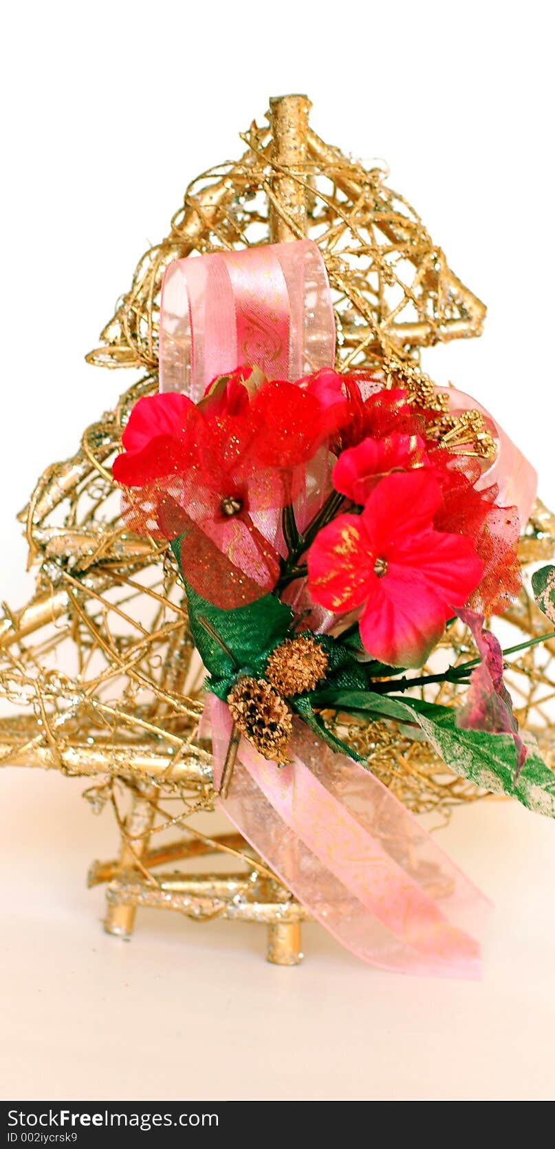 Gold artifical tree with silk flowers. Gold artifical tree with silk flowers