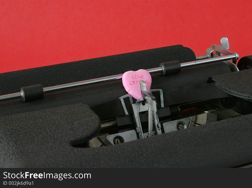 An old-fashioned typewriter delivers a whimsical, romantic, timeless love letter. An old-fashioned typewriter delivers a whimsical, romantic, timeless love letter.