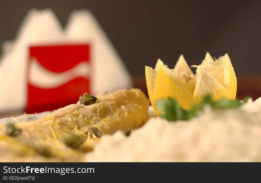 Menu dish, shallow DOF, steak with capers and rice. Menu dish, shallow DOF, steak with capers and rice