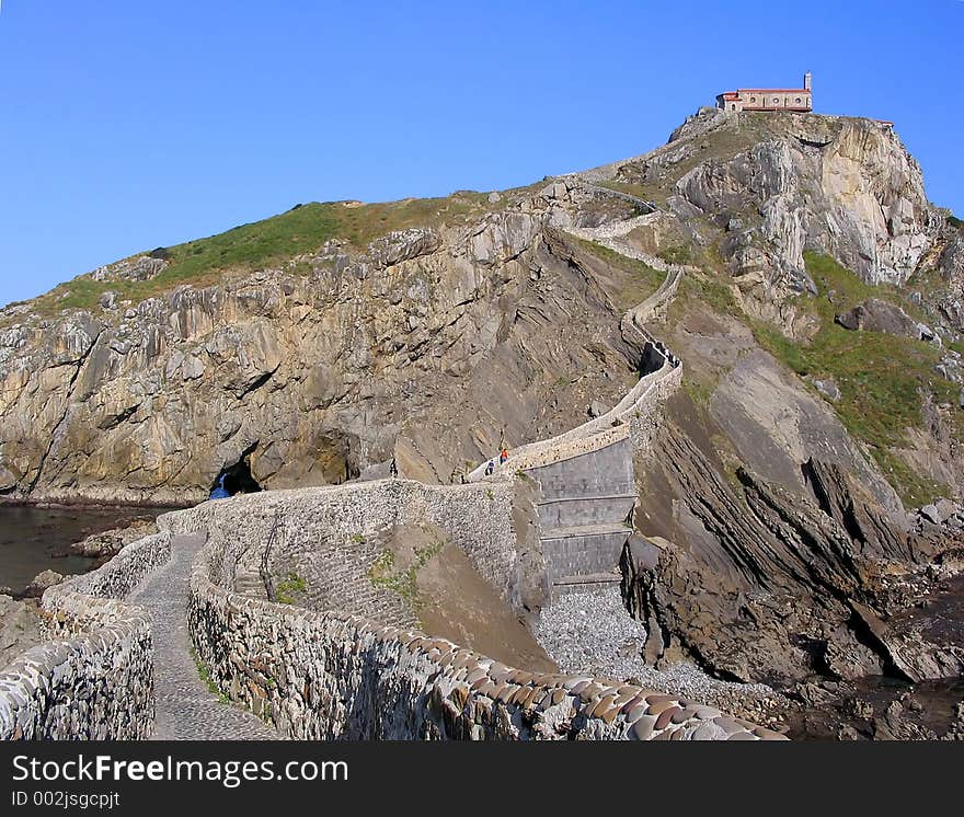 San Juan de Gaztelugatxe (Basque Coast, Spain). This little chapel is build on top of a small island connected to land only by a steep stone stairway with more than 200 steps. San Juan de Gaztelugatxe (Basque Coast, Spain). This little chapel is build on top of a small island connected to land only by a steep stone stairway with more than 200 steps