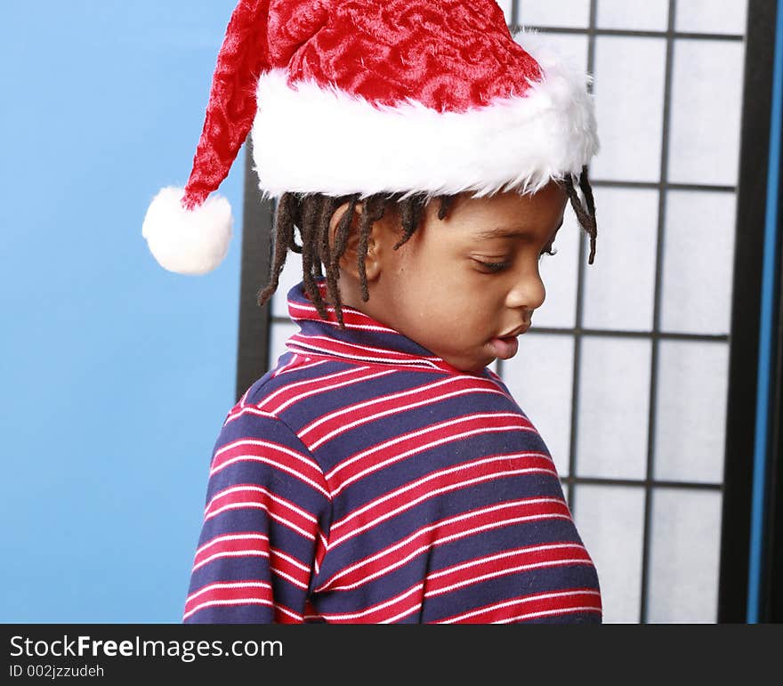 Little Boy In A Santa Hat