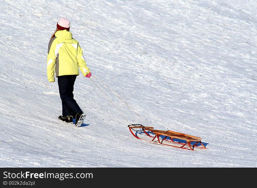 A girl sleighing. A girl sleighing