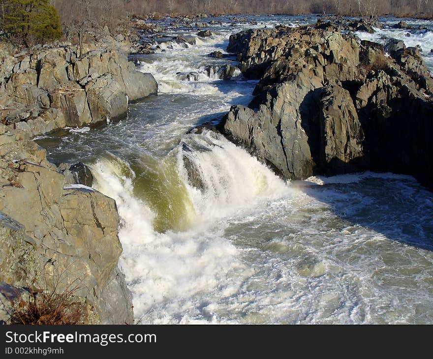 Photo of Great Falls on the Potomac river from the Virginia side. Photo taken during wintertime. The waterfall shown here is a favorite drop for kayakers. Photo of Great Falls on the Potomac river from the Virginia side. Photo taken during wintertime. The waterfall shown here is a favorite drop for kayakers.