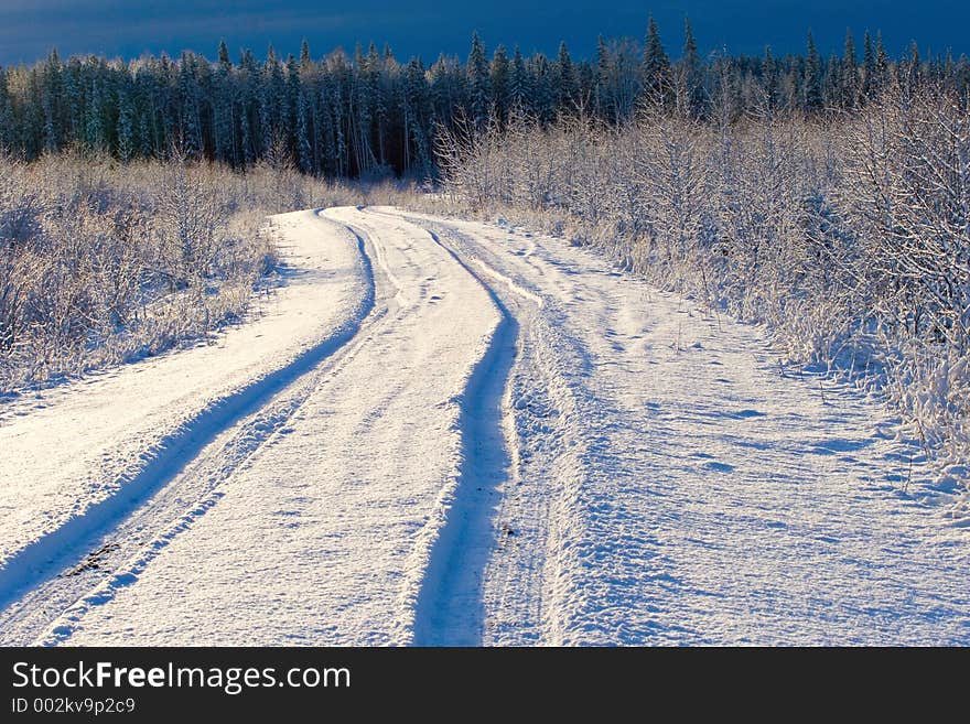 Thick snow covers a backroad in rural Alberta. Thick snow covers a backroad in rural Alberta.