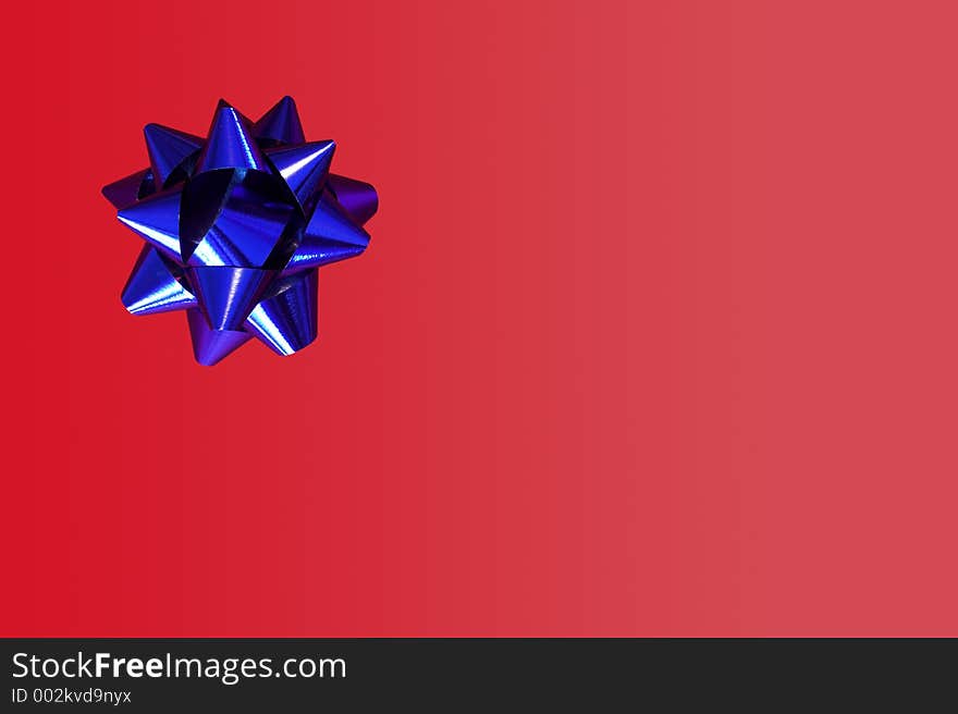 Blue Bow on red background