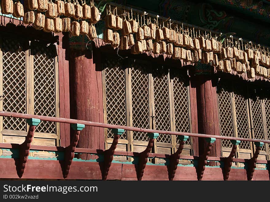 Food hangs at the edge of a Buddhist temple