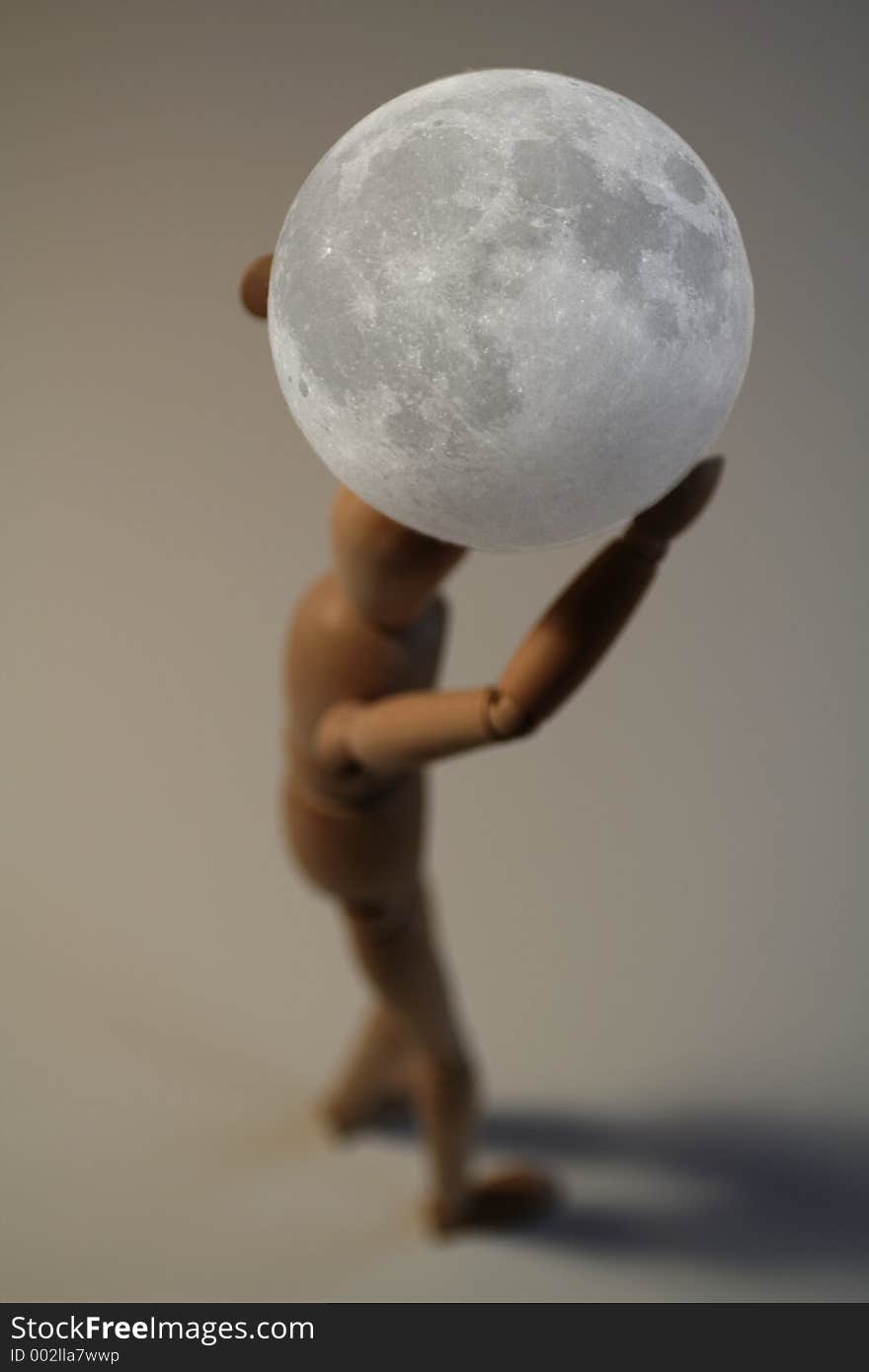 Puppet carrying moon