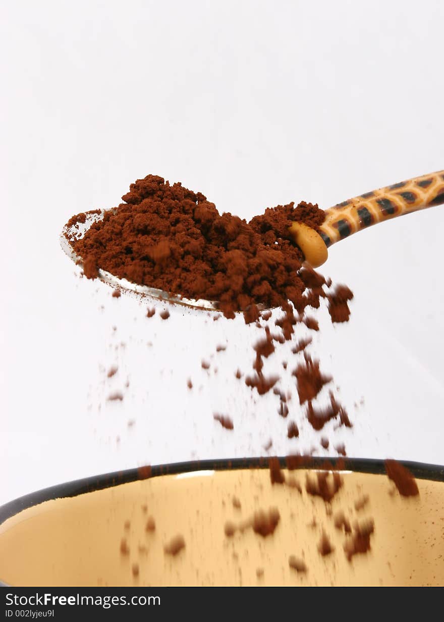 Coffee being prepared in a cup. Coffee being prepared in a cup