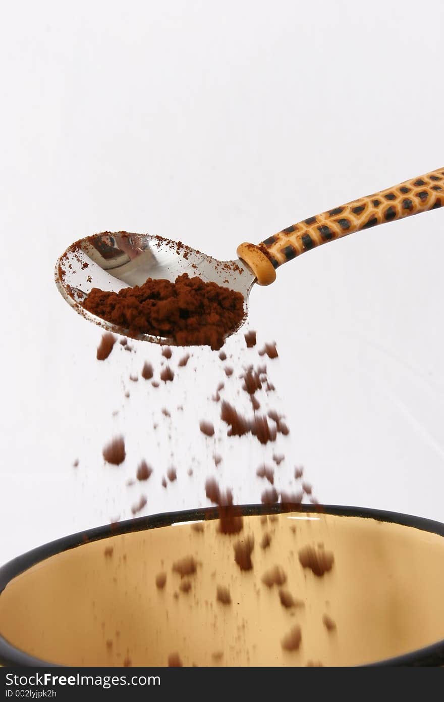 Coffee being prepared in a cup. Coffee being prepared in a cup