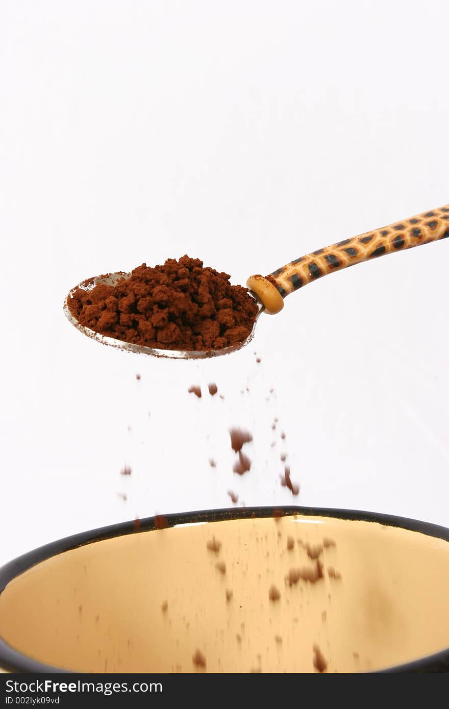 Coffee being prepared in a cup. Coffee being prepared in a cup