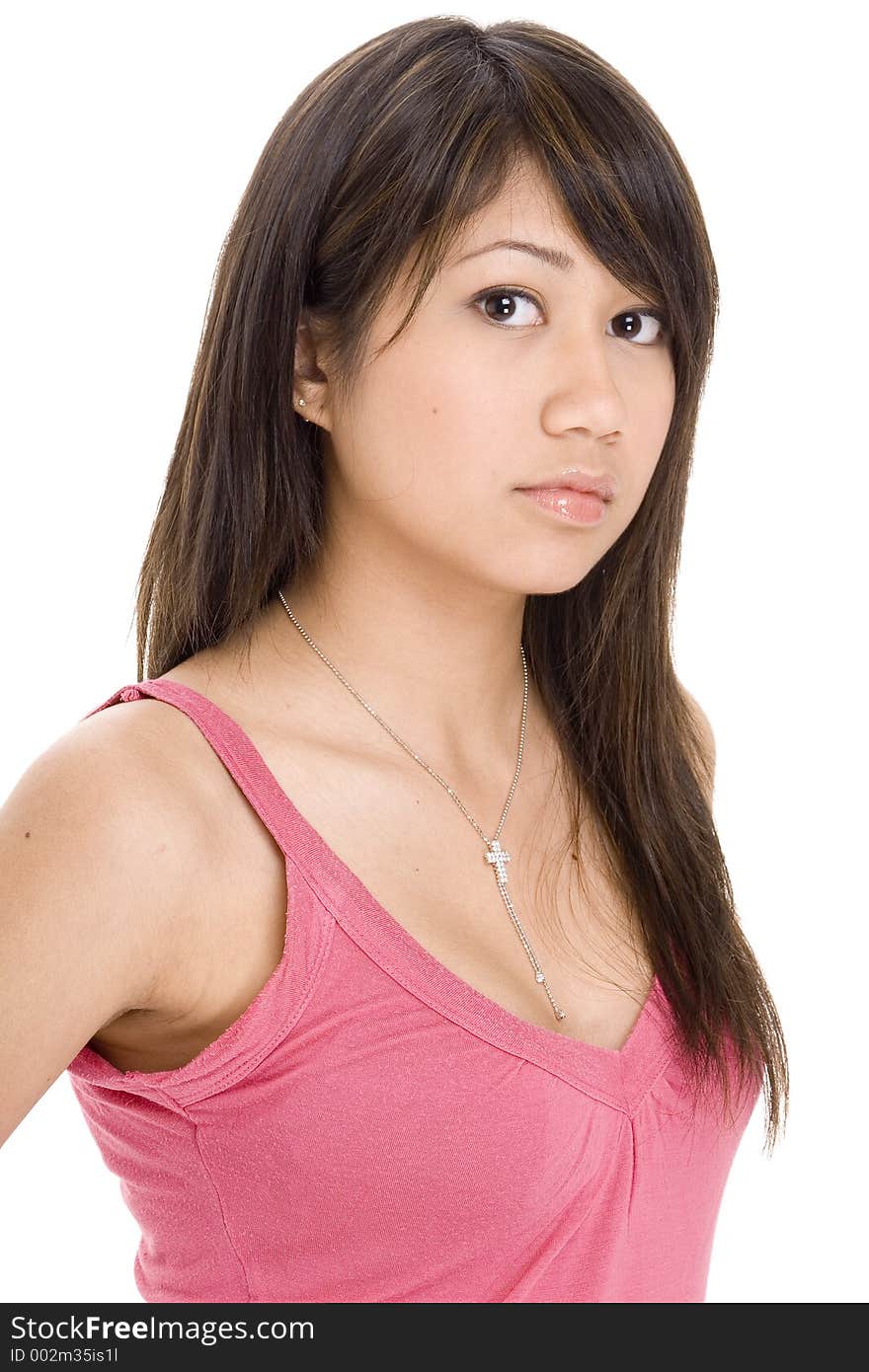 A cute young asian woman in a pink top on white background. A cute young asian woman in a pink top on white background