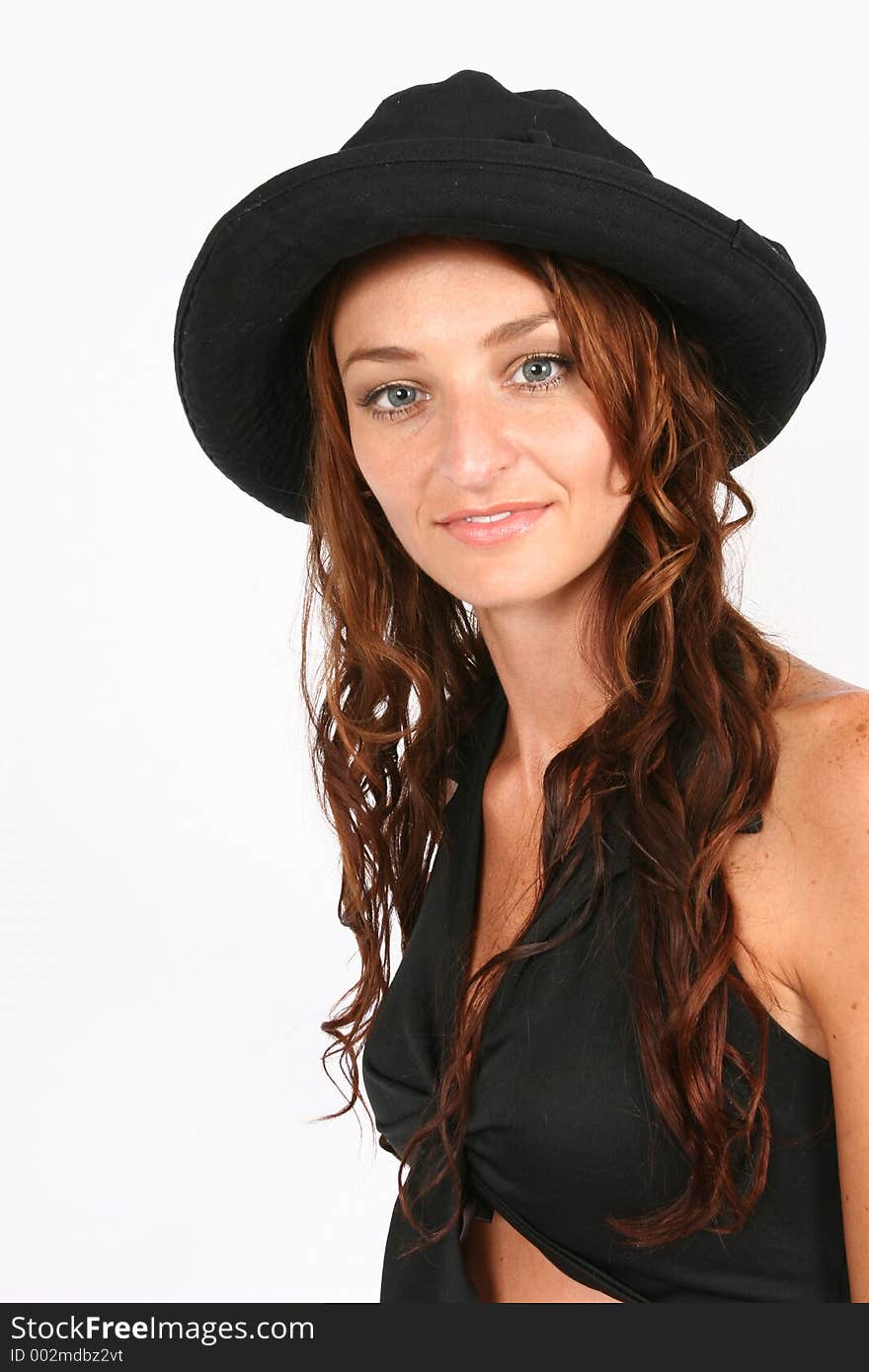 Model posing with her hat on. Model posing with her hat on