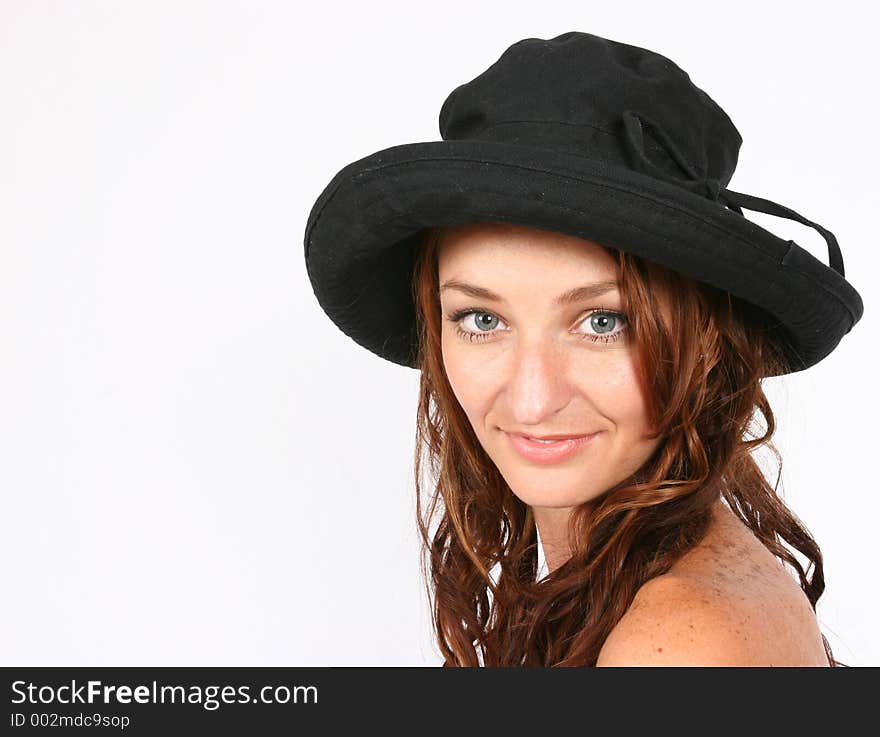 Model posing with her hat on. Model posing with her hat on