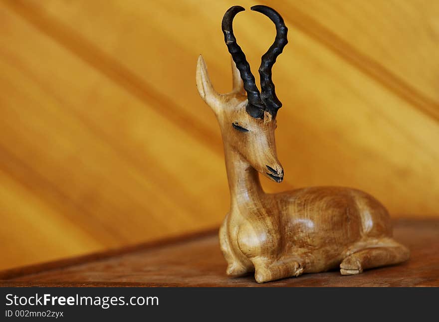 A Handcrafted African Antelope in resting position. A Handcrafted African Antelope in resting position